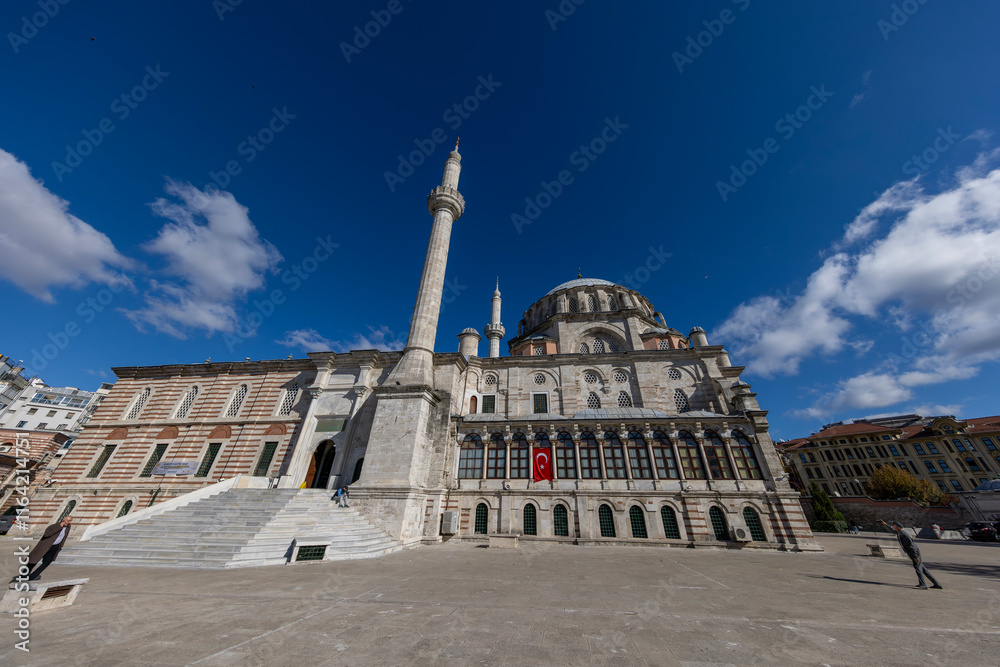 Laleli Mosque also known a Tulip mosque. Exterior shot. Arabic text as decor (verses from Koran, muslim Holy book). Ottoman