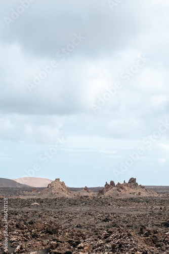 Obraz na płótnie Volcanic lava mountains in Timanfaya National Park in Lanzarote in Spain w salonie