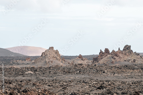 Obraz na płótnie Volcanic lava mountains in Timanfaya National Park in Lanzarote in Spain w salonie