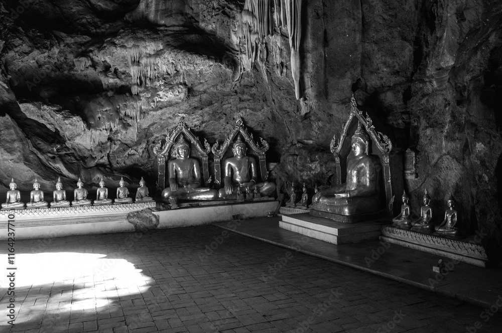 Statue of Buddha in Buddhism Cave in Thum Khao Luang in Phetchaburi Province, Thailand