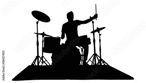 Silhouette of drummer playing drums
