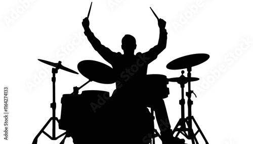 Drummer silhouette in action playing music on stage