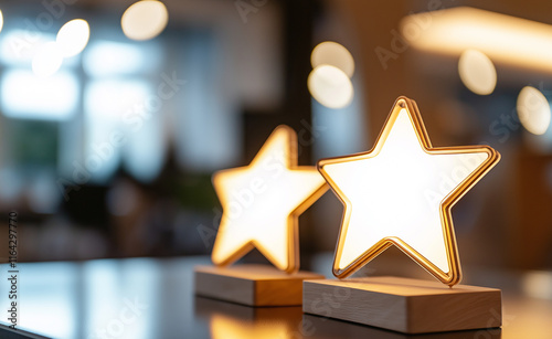 Row of glowing star-shaped lamps on a wooden base, creating a warm and inviting atmosphere. photo