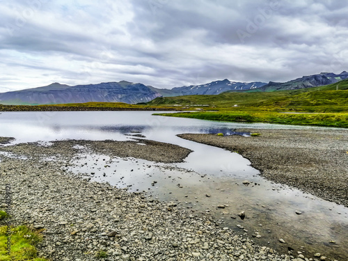 Kirkjufellsfoss landscape Iceland in summer, Snaefellsnes Peninsula photo