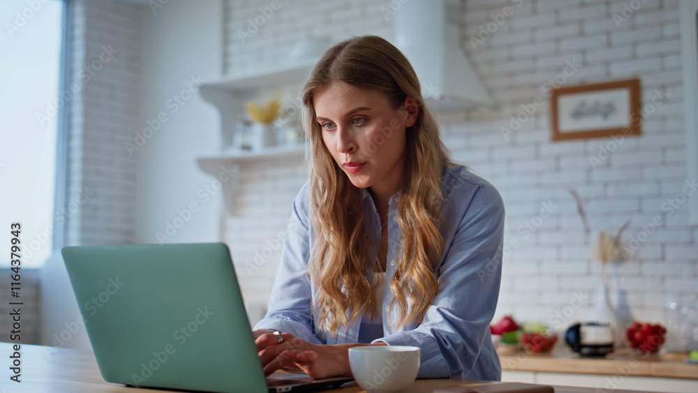 © stockbusters - Online student drinking coffee at home kitchen closeup. Woman looking laptop © stockbusters - Online student drinking coffee at home kitchen closeup. Woman looking laptop