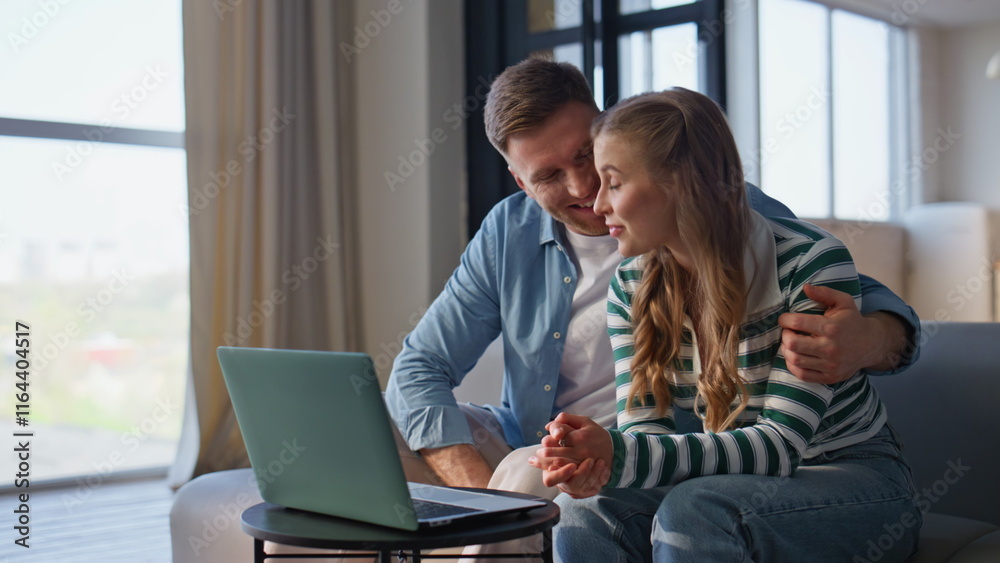 Romantic pair talking online meeting by laptop at home closeup. Couple calling Romantic pair talking online meeting by laptop at home closeup. Couple calling