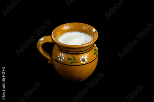 Coconut Atole in a brown traditional Mexican coup 