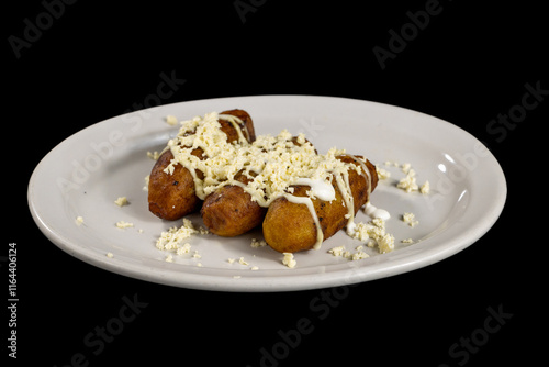 sweet fried plantains with cheese and sour cream