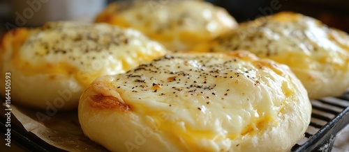 Delicious hachapuri with gooey cheese filling showcasing a tempting snack or meal option perfect for cheese lovers. photo