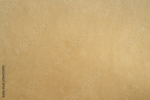 tan toned heavyweight vintage handmade paper - background and texture
