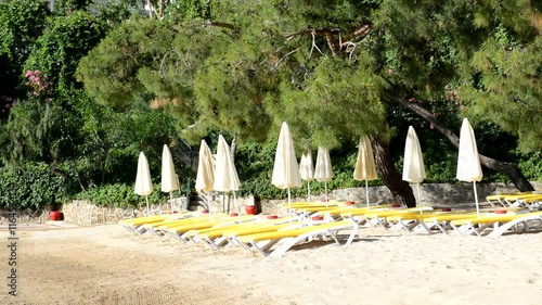 Sand beach on Mediterranean Turkish resort with singing birds and water waves sound
