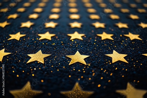 Golden stars on a dark surface create a shimmering visual effect during nighttime events