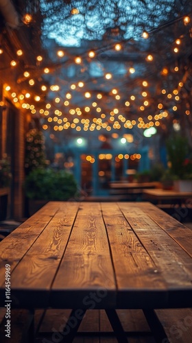 Cozy dining table with a candle in a warmly lit restaurant during evening hours
