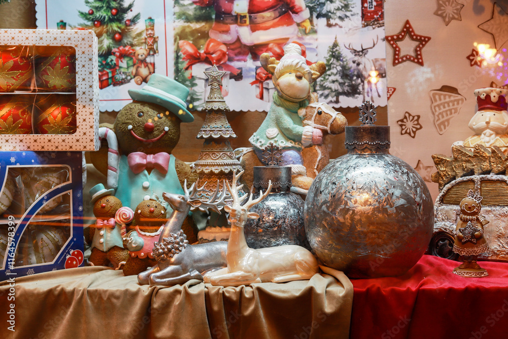ZAKOPANE, POLAND - DECEMBER O3, 2024: A shop window decorated for Christmas with lots of beautiful toys and figurines.