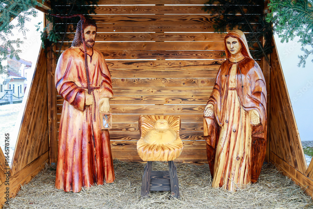 STARA LUBOVNA, SLOVAKIA - DECEMBER 28, 2024: Traditional Christmas decorations, nativity scene with old wooden figurines.