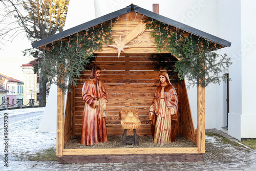 Obraz na płótnie STARA LUBOVNA, SLOVAKIA - DECEMBER 28, 2024: Traditional Christmas decorations, nativity scene with old wooden figurines. w salonie