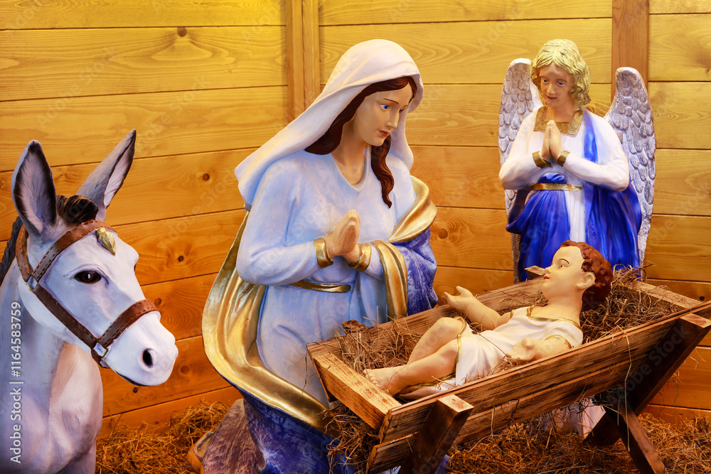SPYTKOWICE, POLAND - DECEMBER 29, 2024: Traditional Christmas decorations, nativity scene by the church in Spytkowice, Poland.
