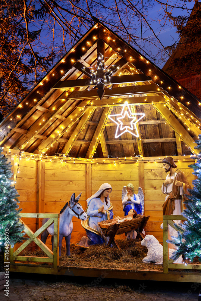 SPYTKOWICE, POLAND - DECEMBER 29, 2024: Traditional Christmas decorations, nativity scene by the church in Spytkowice, Poland.