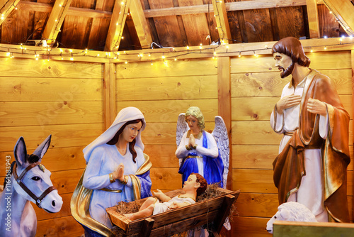 SPYTKOWICE, POLAND - DECEMBER 29, 2024: Traditional Christmas decorations, nativity scene by the church in Spytkowice, Poland.