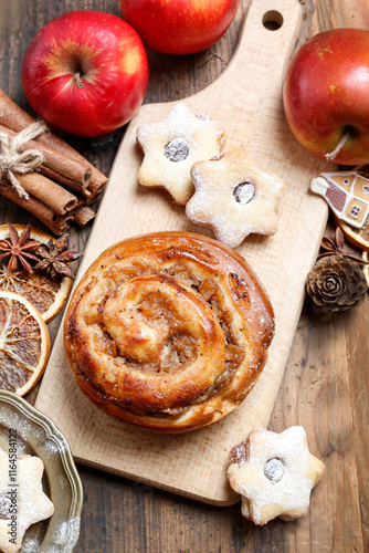 Traditional Christmas rolls with apple filling and cinnamon. photo