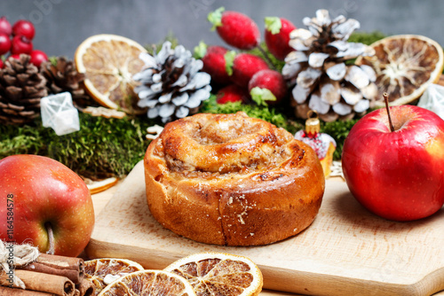 Obraz na płótnie Traditional Christmas rolls with apple filling and cinnamon. w salonie