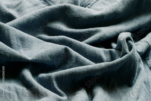 Obraz na płótnie Abstract background with blue wavy linen fabric. w salonie