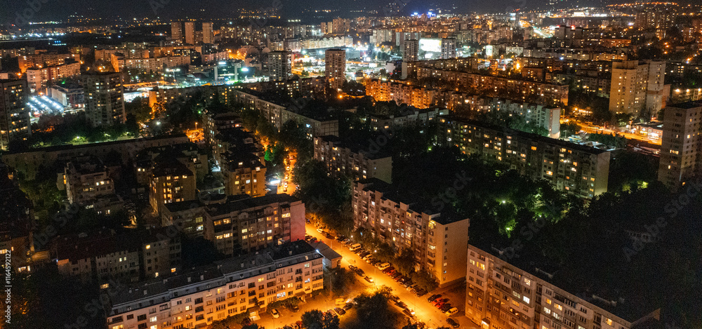 A panoramic aerial view of the city at night.