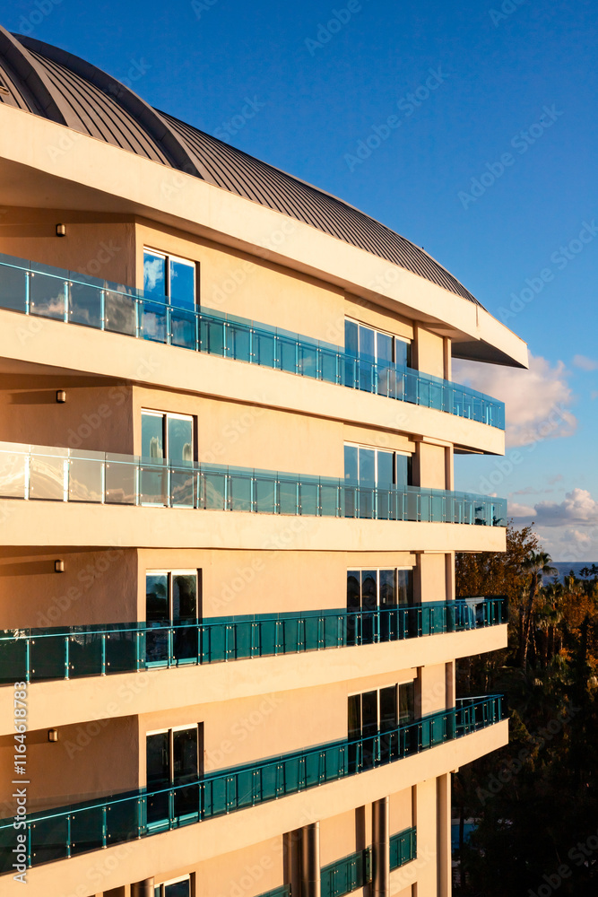 Obraz premium Glass balconies in luxury hotel, modern architeture, glass balustrade, vacation hotel, all-inclusive hotel