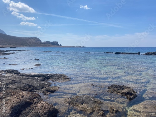 The rocky ocean shore on the island photo