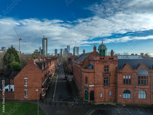 Salford Street and city skyline with Salford Lad's Club