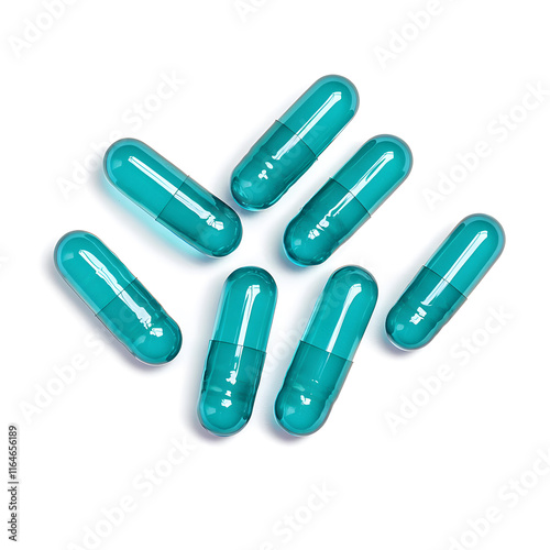 Medical blue capsules pile top view isolated on white