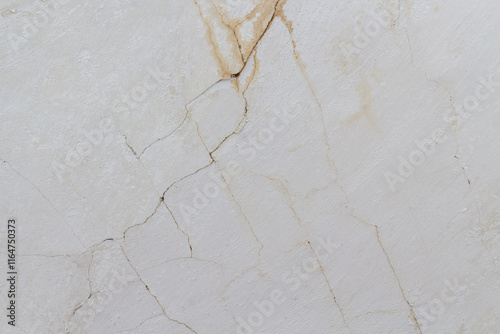 Fototapeta Naklejka Na Ścianę i Meble -  a yellow crack in the white ceiling through which water flowed