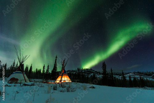 Aurora borealis over the mountains, Yukon, Canada