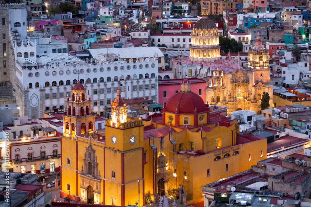 Fototapeta premium Guanajuato City, Mexico, aerial view of historical buildings in evening twilight. Close up of Templo de San Felipe Neri