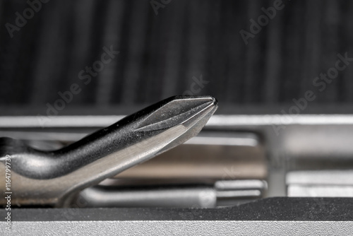 Close up view of Philips head screw driver in the tool set