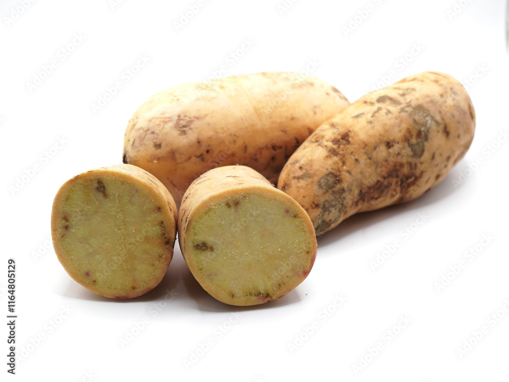 Ubi cilembu (sweet potatoes) isolated on a clean white background Ubi cilembu (sweet potatoes) isolated on a clean white background