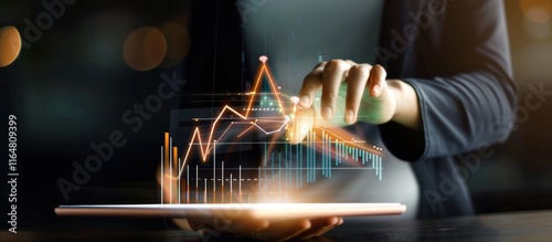Businesswoman analyzing financial data on tablet.