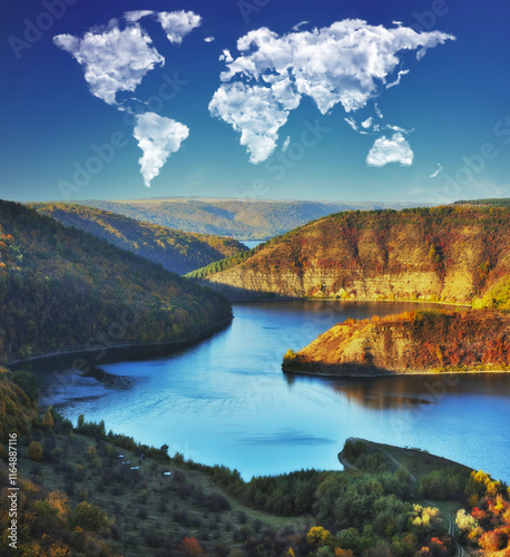 clouds in the form of a world map over the river canyon. Travel and landscape concept. autumn morning