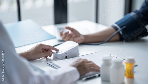 Medical Examination Doctor Conducting Blood Pressure Test on Patient for Diagnosisใ photo