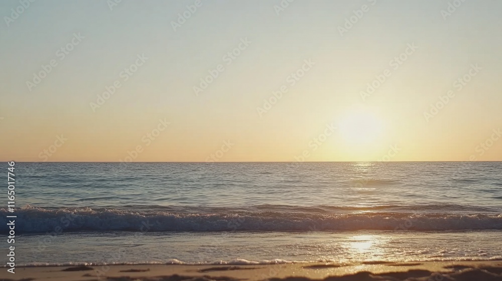 Fototapeta premium Serene Sunset Over Calm Ocean Waves on Tranquil Beach Shoreline