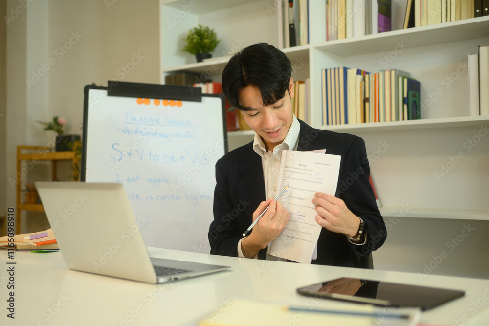 Smiling tutor explaining a worksheet to student during an online learning session Smiling tutor explaining a worksheet to student during an online learning session