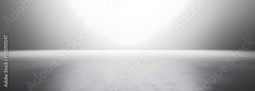 A vast empty room with a pale gray backdrop, offering a neutral, sleek environment for product presentation