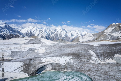 Tien shan  mountains with glacier and tarn lake photo