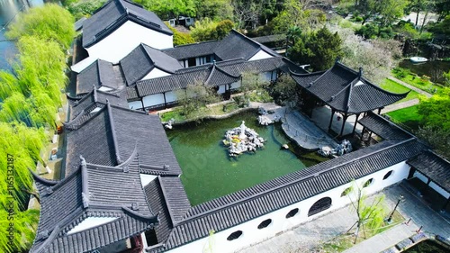 Explore Mochou Lake Park in Nanjing with stunning aerial views of traditional architecture and serene landscapes photo