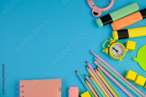Colourful school supplies on a background back to school concept