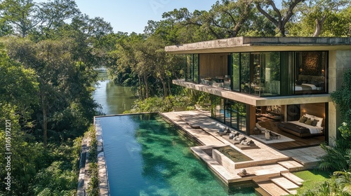 Luxurious house with pool next to river.