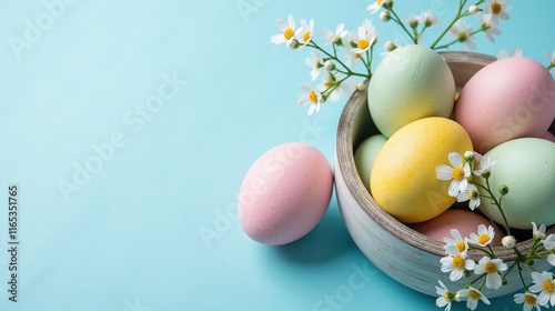 Easter Eggs and Spring Flowers on Blue Background