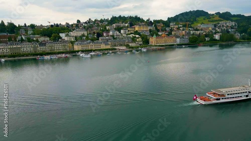 4K Drone Video of the Yachts and Boats on Lake Luzern near Hotel Schweizerhof in Lucerne, Switzerland photo