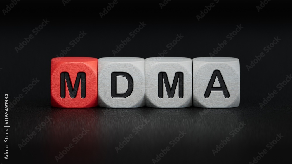 Obraz premium cubes with the word MDMA. Care concept.close up of wooden elements,Business Concept.3D rendering on black background.