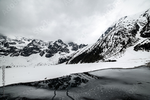 Fototapeta Naklejka Na Ścianę i Meble -  Frozen Lake Morskie Oko or Sea Eye Lake in Poland at Winter.